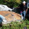 Preston Young taking a look at Lee's newly acquired 1953 Studebaker Champion Coupe