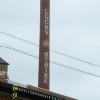 The old 'Lucky Strike" smoke stack on Tobacco Row viewed from canal.