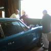 Lee discussing the 1967 Avanti II with Linwood Melton, Preston Young and Fred Meiner