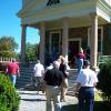 Group gathering on the front porch to start the tour of the main house