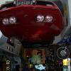 Entering Quaker Steak under Corvette suspended from ceiling.