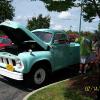 Brian Dahl and  Kim Branch discussing  Brian's 1957 Studebaker pickup