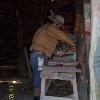 Interpreter shows woodwork shop at Henricus