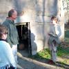 Marjorie Meiners and Darryl Terratta listen as an interpreter discusses native living conditions.