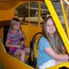 Julia & Jordan Jenkins at the Piper Cub controls