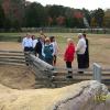 Our guide provides the group with information about the earth works.