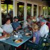Studebaker drivers enjoy good food and conversation on the patio at Extra Billy's