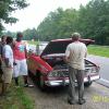 Lee Harrison gets the hard luck award with his 1964 Lark Daytona Convertible on the way to Blackstone.